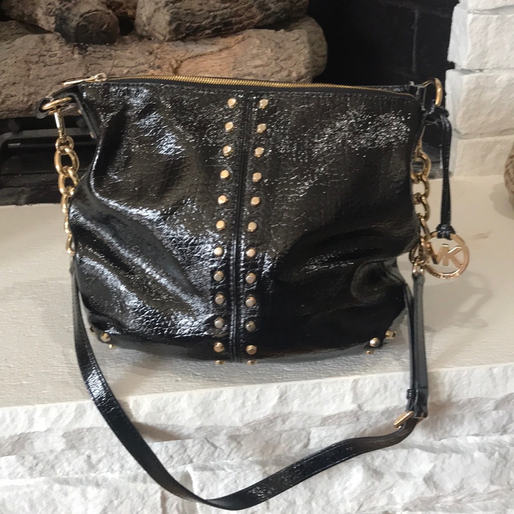 Michael Kors black purse with gold accent